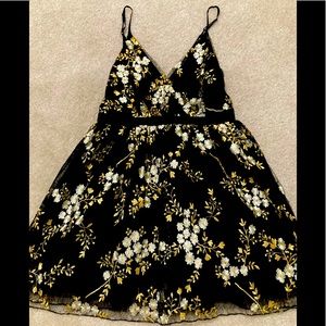 Gold and black lace dress.